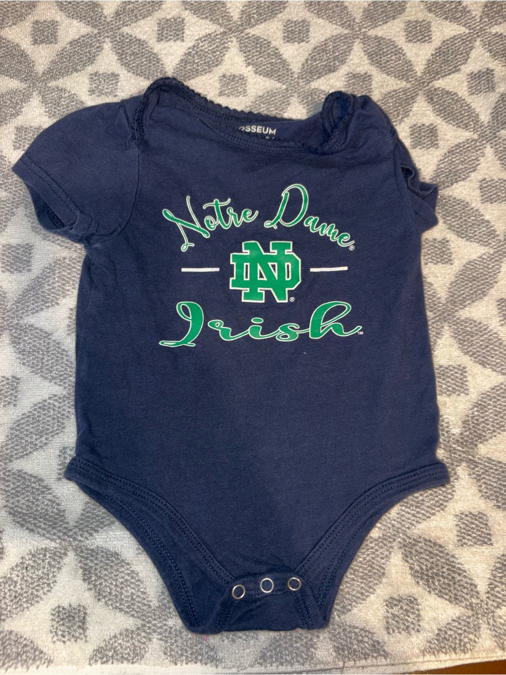 Colosseum Navy Baby Bodysuit with Green & White Notre Dame Logo